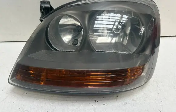 Nissan Almera Tino Headlight/headlamp 96432300