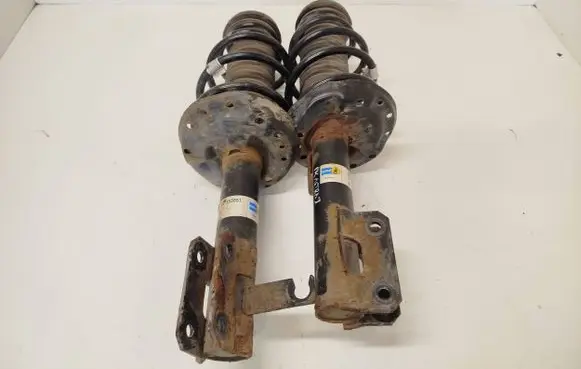Opel Astra J Front shock absorber with coil spring 22183644