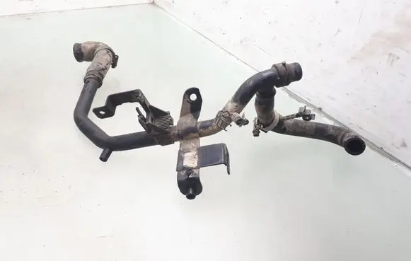Volkswagen PASSAT B5 Engine coolant pipe/hose 028121065AE