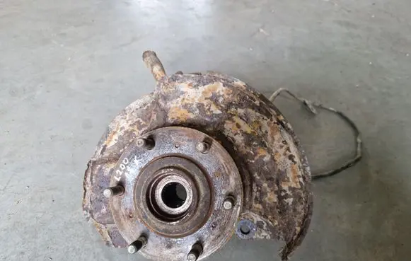 Front wheel hub spindle knuckle