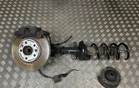 Front wheel hub spindle knuckle