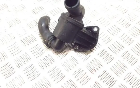 Thermostat/thermostat housing