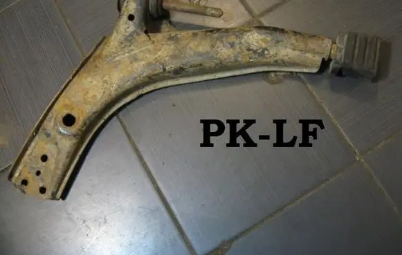 Opel Kadett E Front lower control arm/wishbone 90634782
