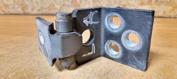 Front door lower hinge