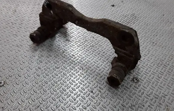 Suzuki Liana Front Brake Caliper Pad/Carrier 