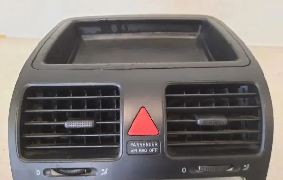Volkswagen Golf IV Dash center air vent grill 1K0815735B