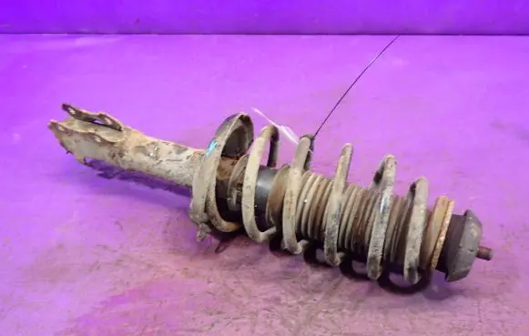 Front shock absorber with coil spring