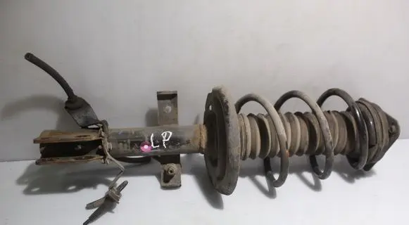 Renault Clio IV Front shock absorber with coil spring