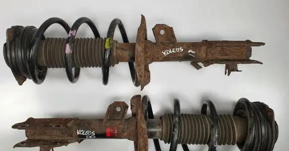 Renault Koleos I Front shock absorber with coil spring