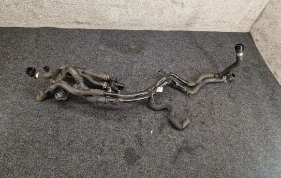 Volkswagen PASSAT B8 Engine coolant pipe/hose 5Q0121065H 5Q0121049BF 4Q0122086F