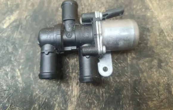 Coolant heater control valve