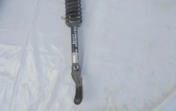 Jeep Grand Cherokee Front shock absorber with coil spring 68080208AB