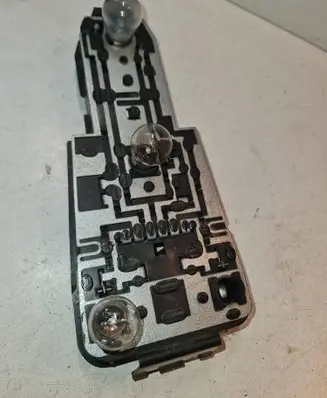 Volkswagen PASSAT B2 Tail light bulb cover holder 321945257G