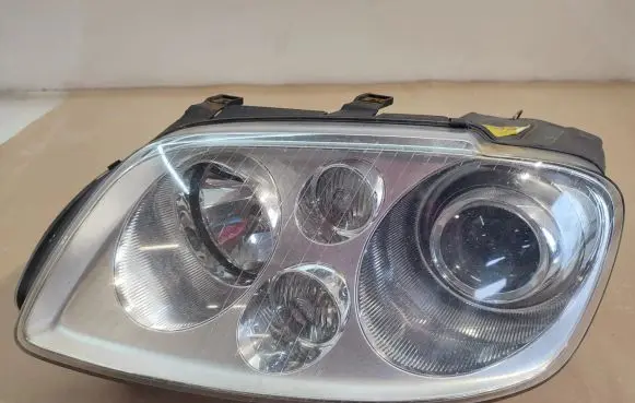 Volkswagen Touran I Headlight/headlamp 0301205271