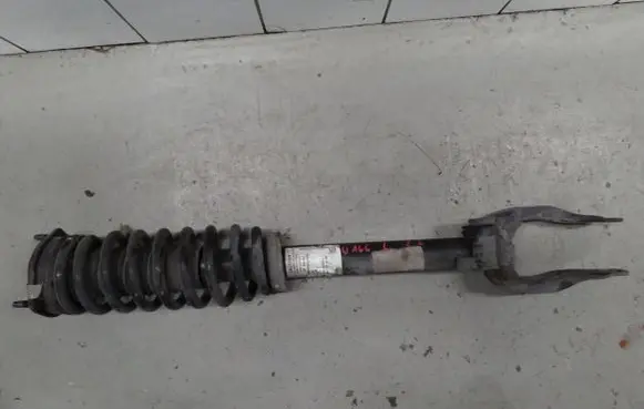 Mercedes-Benz ML W166 Front shock absorber with coil spring A1663231000