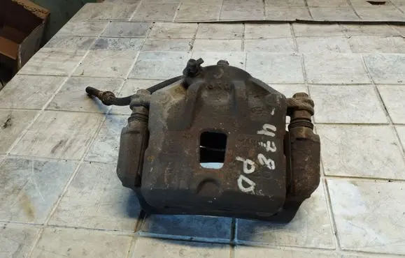 Hyundai Tucson JM Front brake caliper