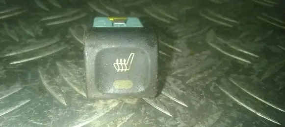Seat heating switch