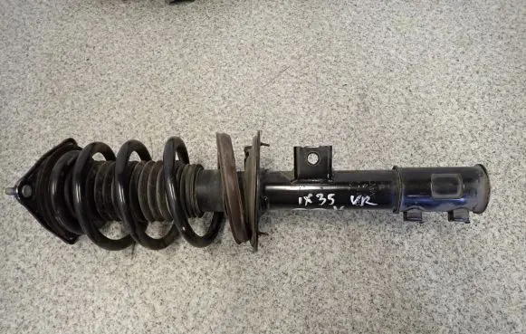 Hyundai ix35 Front shock absorber with coil spring