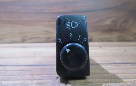 KIA Clarus Headlight level height control switch