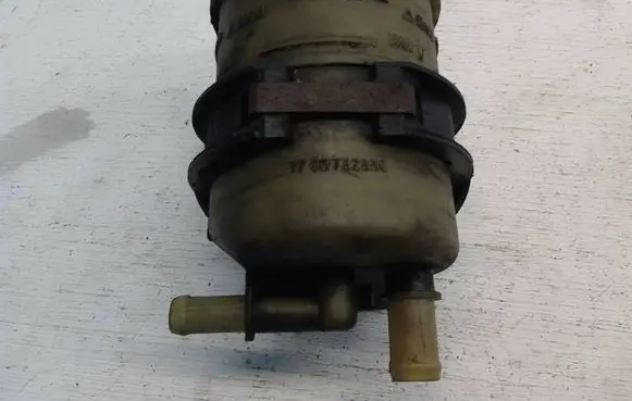 Opel Vivaro Power steering fluid tank/reservoir 7700782884