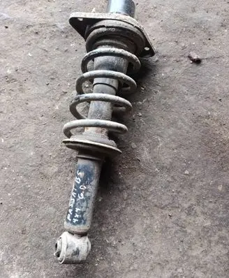 Volkswagen PASSAT B5 Rear shock absorber with coil spring 