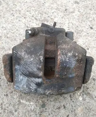 Volkswagen Golf V Front brake caliper