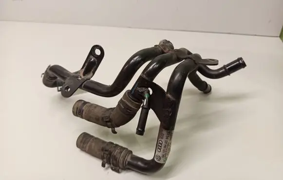 Volkswagen Golf VII Engine coolant pipe/hose 04L121064AD