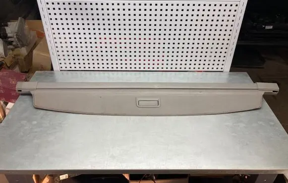 Volkswagen Touran I Parcel shelf load cover 1T0867871