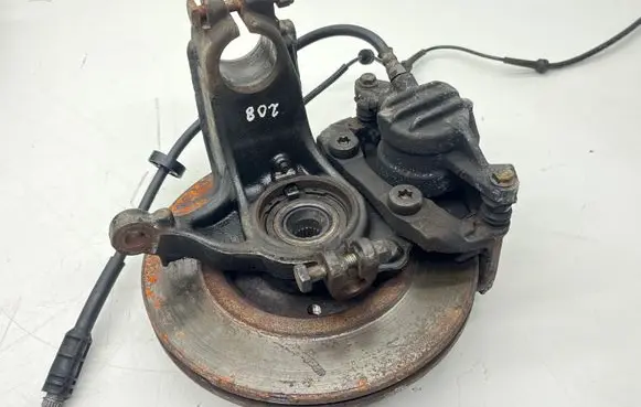 Peugeot 208 I Front wheel hub spindle knuckle 1607557480 Y01131