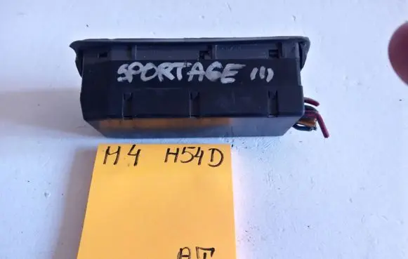 KIA Sportage Central console control unit 1212123