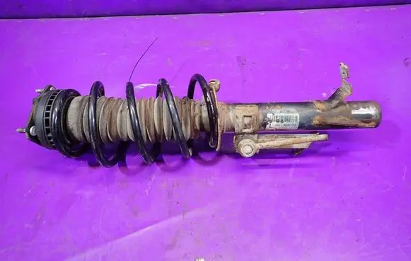Ford Fiesta Front shock absorber with coil spring 