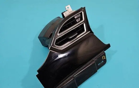 Dash center air vent grill
