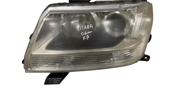 Suzuki Grand Vitara II Headlight/headlamp 10059079