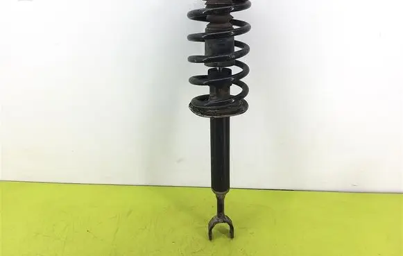 Front shock absorber with coil spring