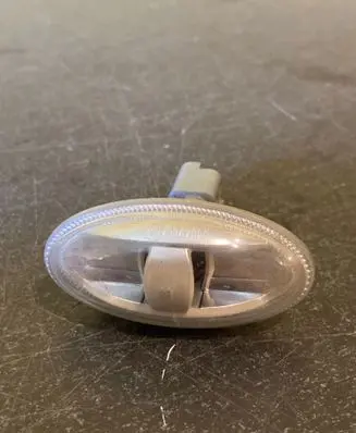 Citroen Berlingo Front fender indicator light 0104706