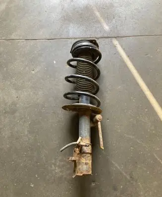 Nissan X-Trail T31 Front shock absorber with coil spring 54302JG72A 824903003777
