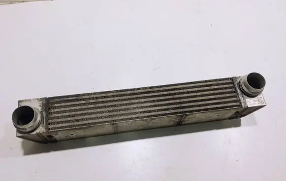 BMW 5 E60 E61 Intercooler radiator 7795823 F6438000