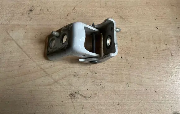 Front door lower hinge