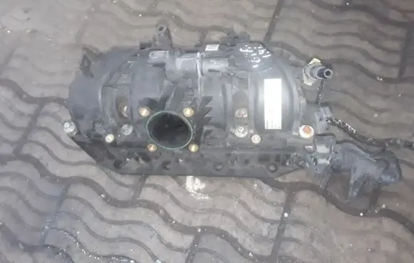 Opel Tigra B Intake manifold 0280600069 55559834