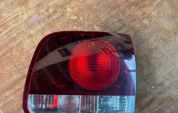 Volkswagen Touareg I Tailgate rear/tail lights 7L6945094T