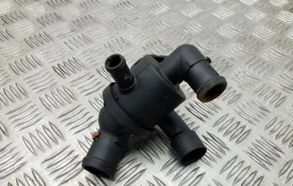 Thermostat/thermostat housing