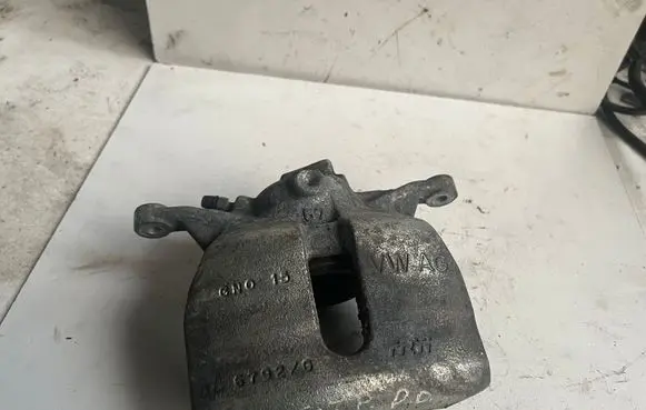 Volkswagen Golf VII Front brake caliper