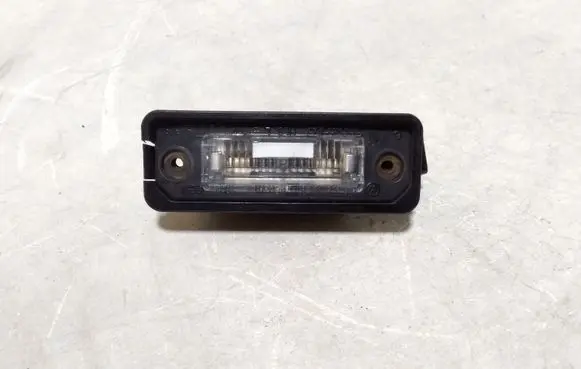 Volkswagen PASSAT B6 Number plate light 1J6943021B
