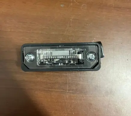 Volkswagen Golf V Number plate light FTL5310900