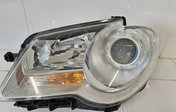 Volkswagen Touran I Headlight/headlamp 0301233201