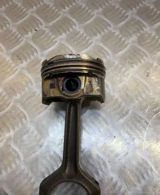 Piston with connecting rod