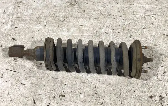 Nissan Navara D40 Front shock absorber with coil spring