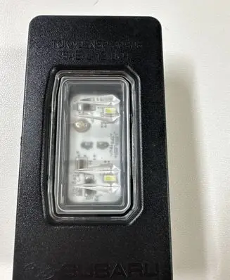 Subaru Legacy VII Number plate light 84301AN000