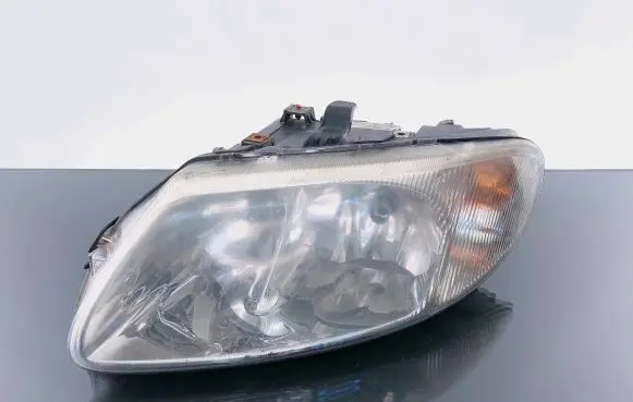 Chrysler Grand Voyager IV Headlight/headlamp 58701000000 04857703AB