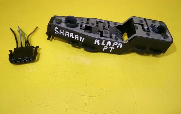 Tail light bulb cover holder